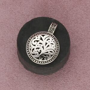 sterling silver scroll disc pendant